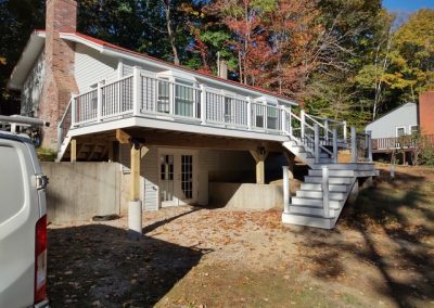 Distant view of deck revamp project by AMC Carpentry